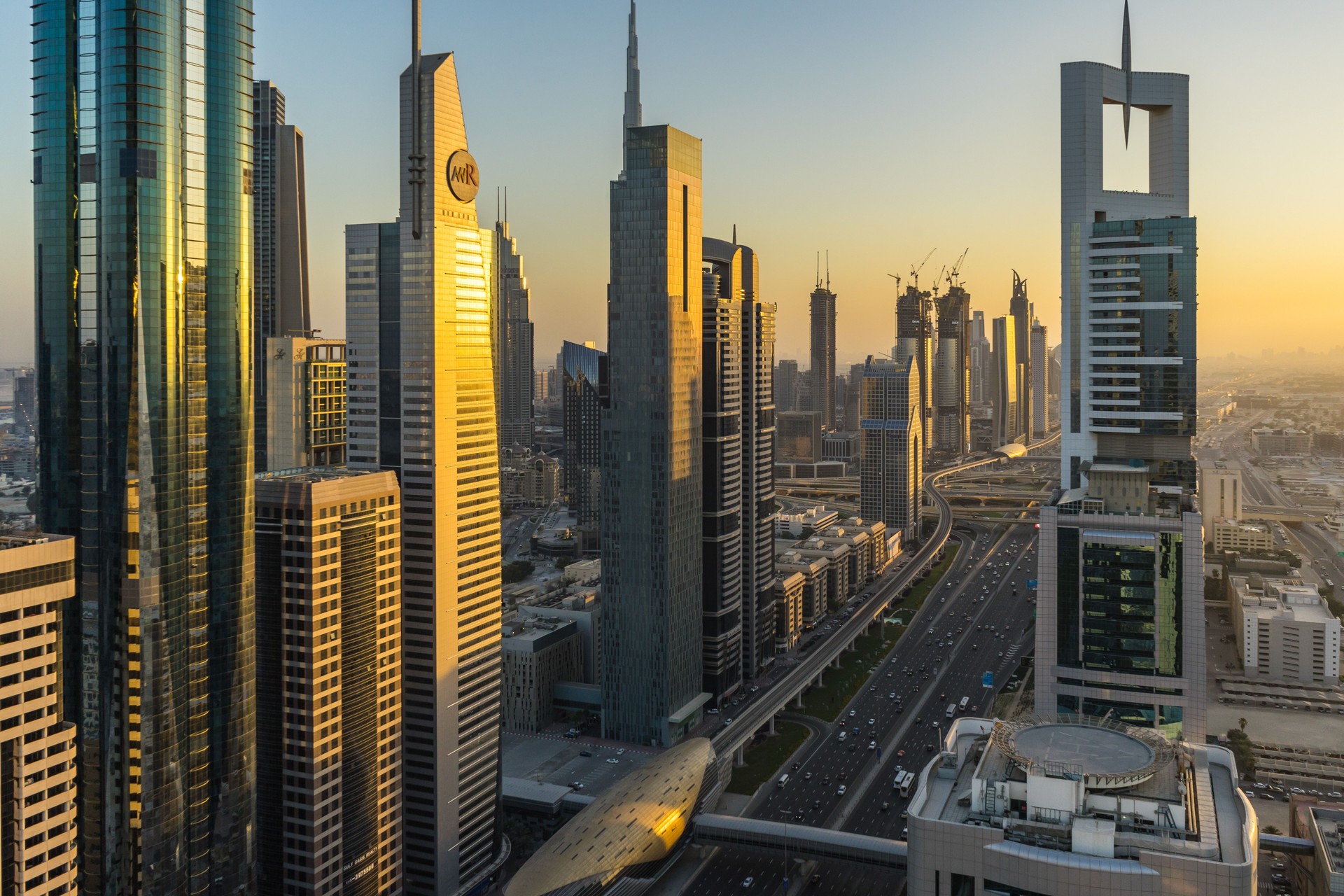 Sheikh Zayed Road between skyscrapers at sunset, UAE United Arab Emirates